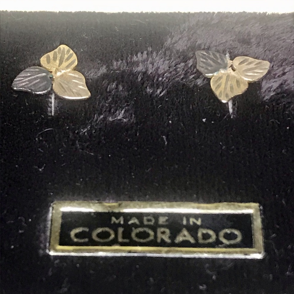 Gold stud earrings
